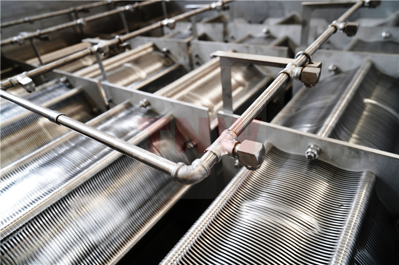 疊螺機環片中間跑泥的原因和解決方案